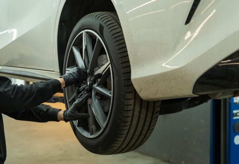 Close-up view of tire repair work performed on a vehicle in Central Minnesota